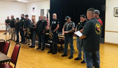 Patching in new full members and auxiliary members at the state meeting in Elkins, WV